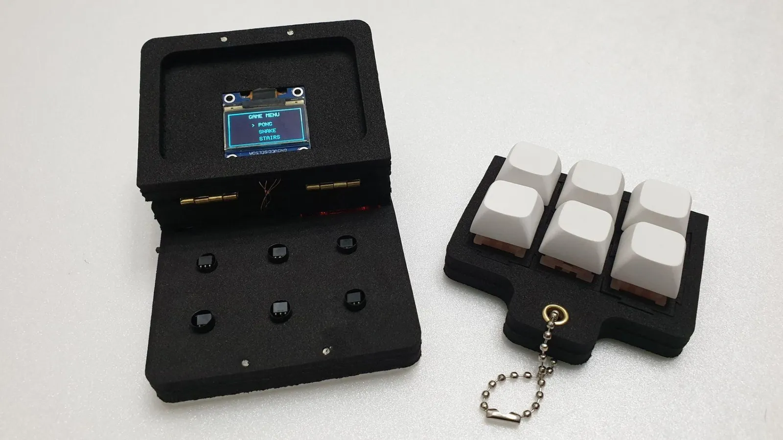 Introducing the GameBox Clicker: a 'modular magnet key game console' made out of a fidget toy
